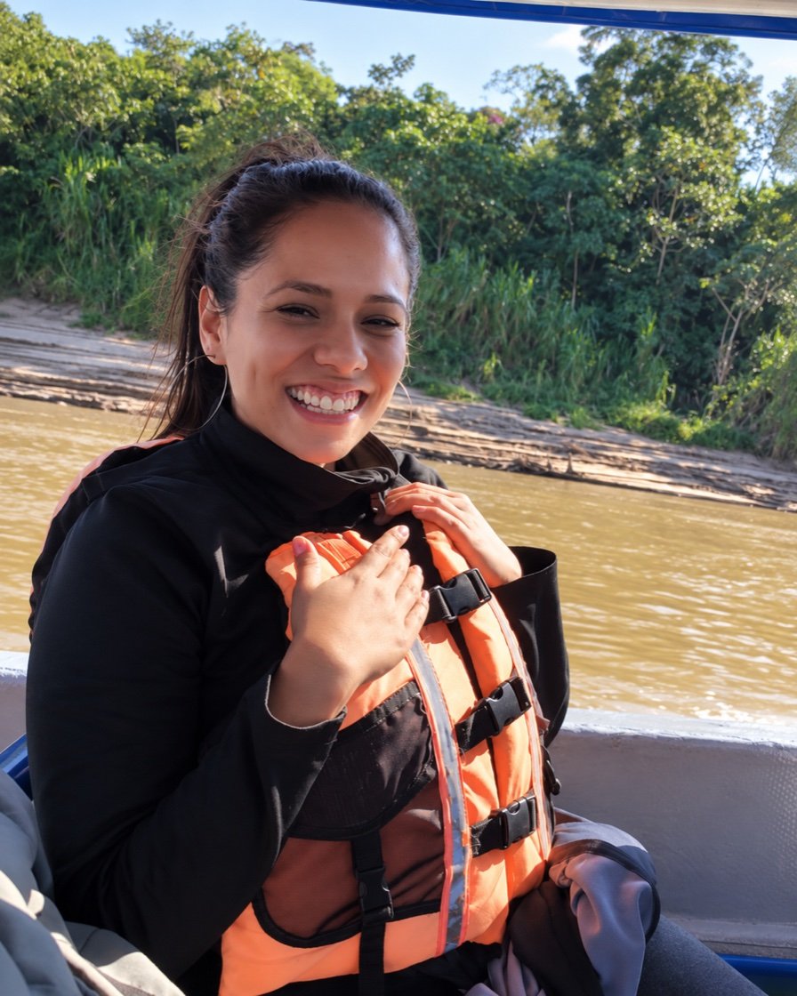 Natalia smiling during a river journey